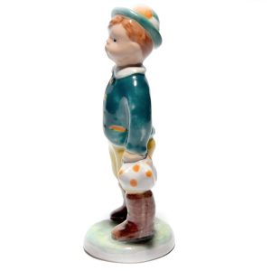 Porcelain Figurine of Boy with Green Hat, Green Jacket, and Boots, Hand-Painted Vintage Collectible Sculpture, Charming Decorative Piece