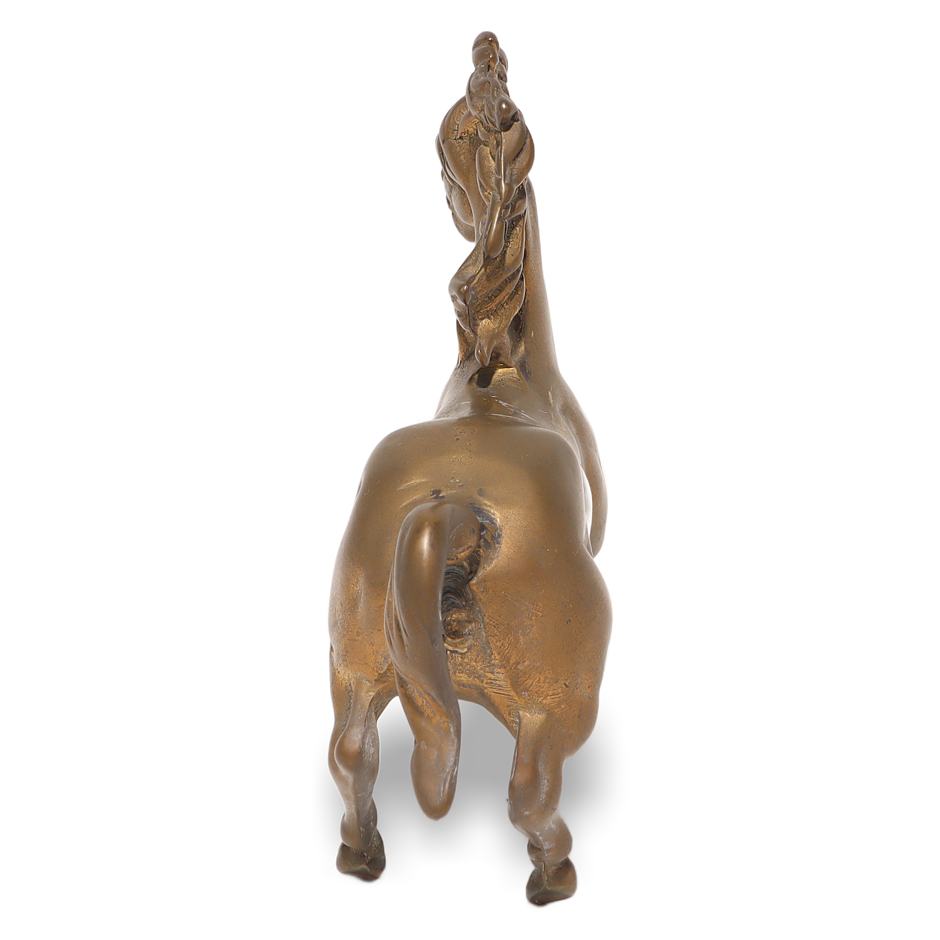 Vintage Brass Horse Figurine Detailed View from Back Brass horse figurine close up rear view, vintage decorative collectible statue