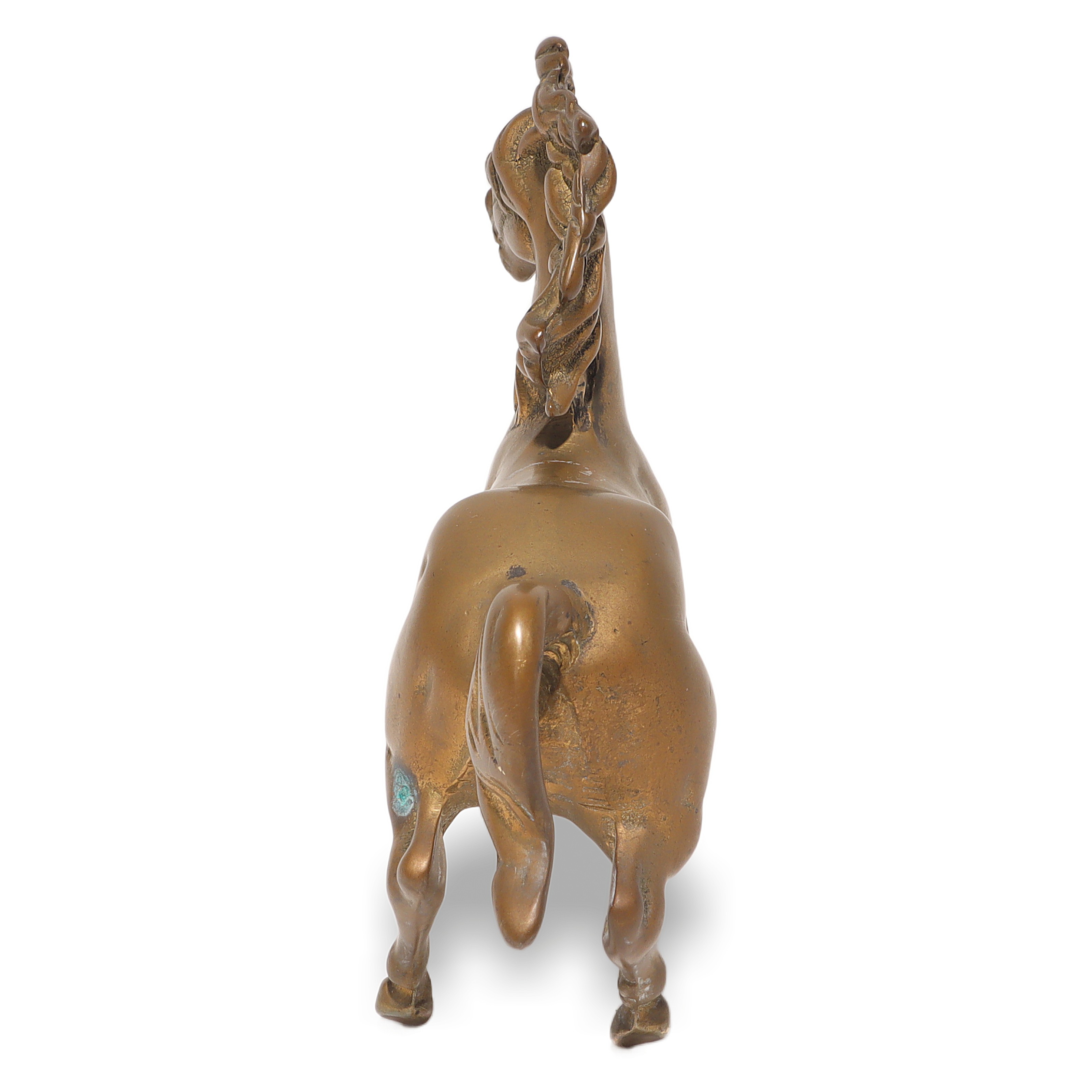 Vintage Brass Horse Figurine Detailed Rear View Brass horse figurine close up of back and tail, vintage decorative collectible