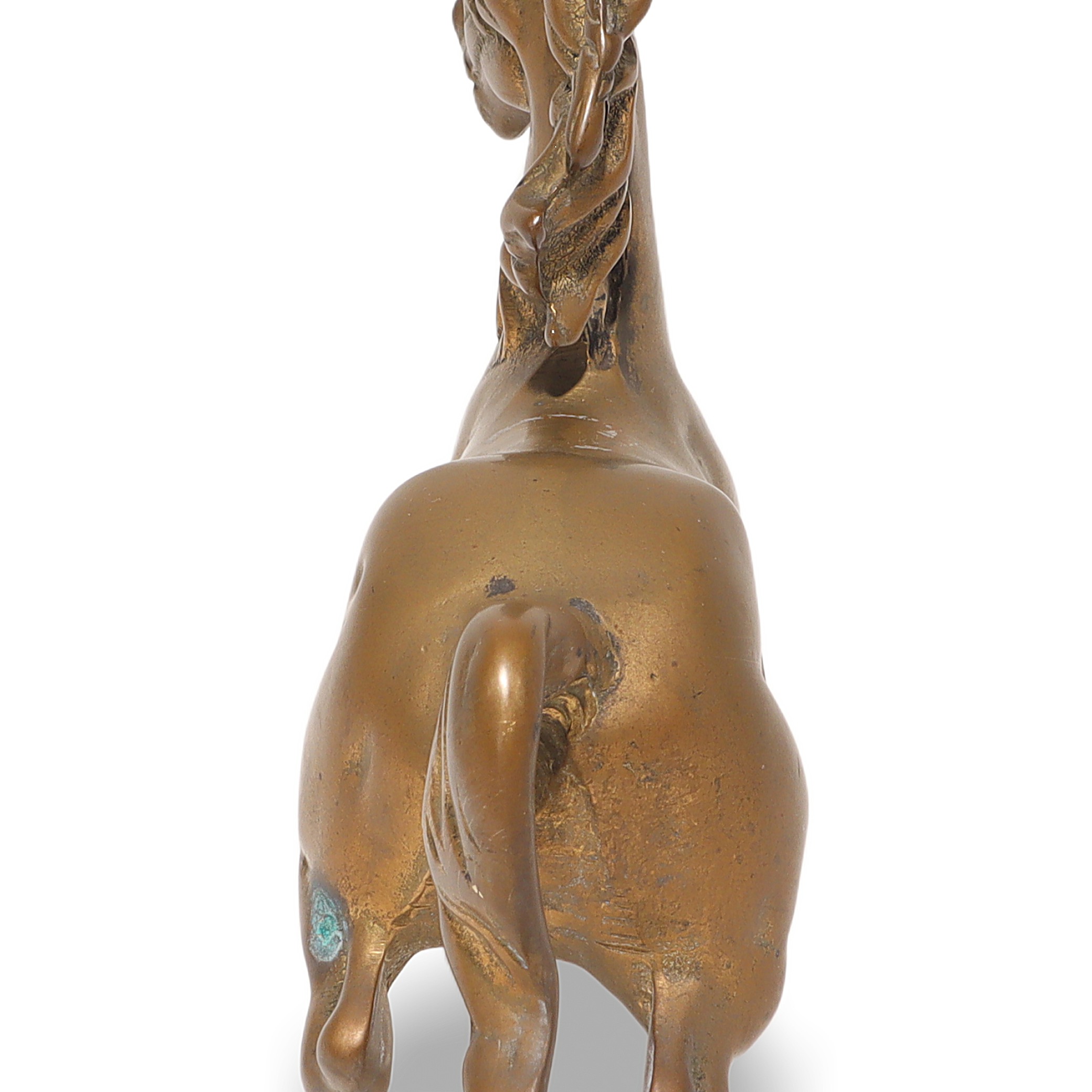Vintage Brass Horse Figurine Detailed View from Behind Brass horse figurine close up showing back and tail, vintage decorative collectible